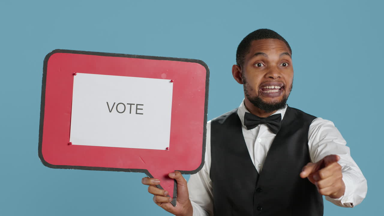 Political bellboy hotelier showing a speech bubble with the message to vote