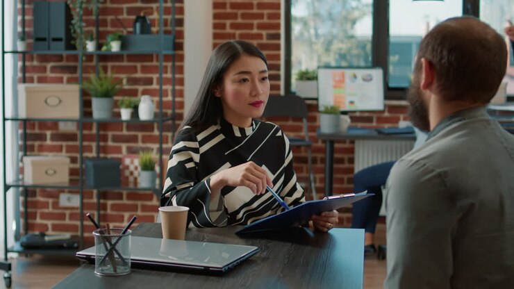 Diverse team of people discussing job offer and application