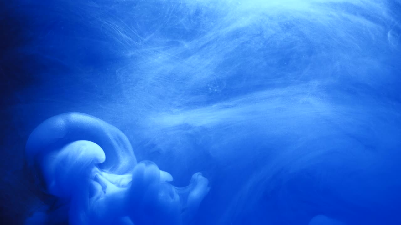 movimiento de tinta azul tinte inyectar flujo de flujo giratorio