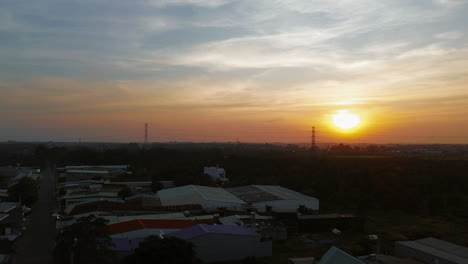 sunset over industrial area