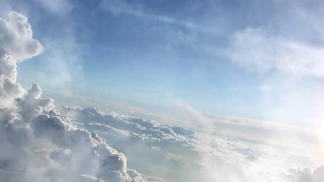 cumulus clouds moving in the clear blue sky
