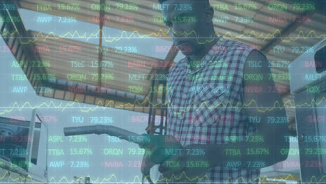 animation of financial data processing over man at the gas station