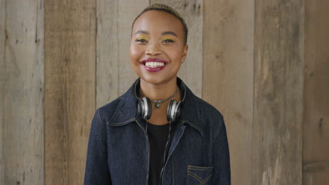 portrait of happy african american woman laughing enjoying lifestyle successful black student girl wearing trendy fashion slow motion real people series