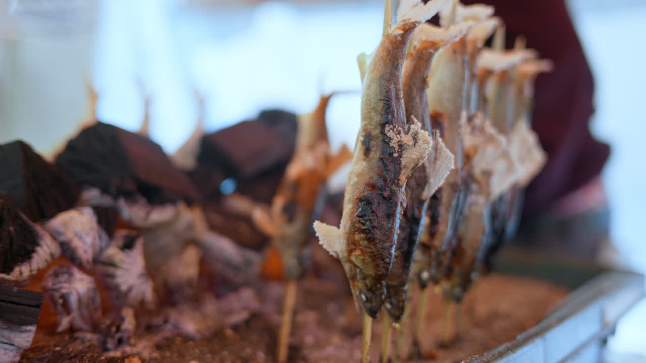 Close up of smoked fish at a street food market in Japan