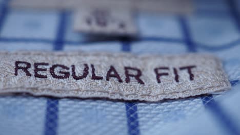 close up of a regular fit clothing tag