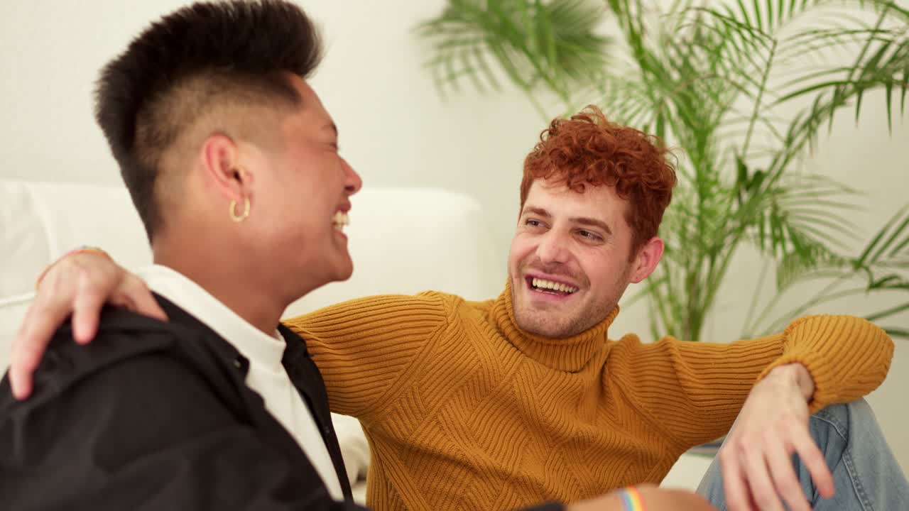 A loving LGBTQ+ couple sharing a tender moment at home