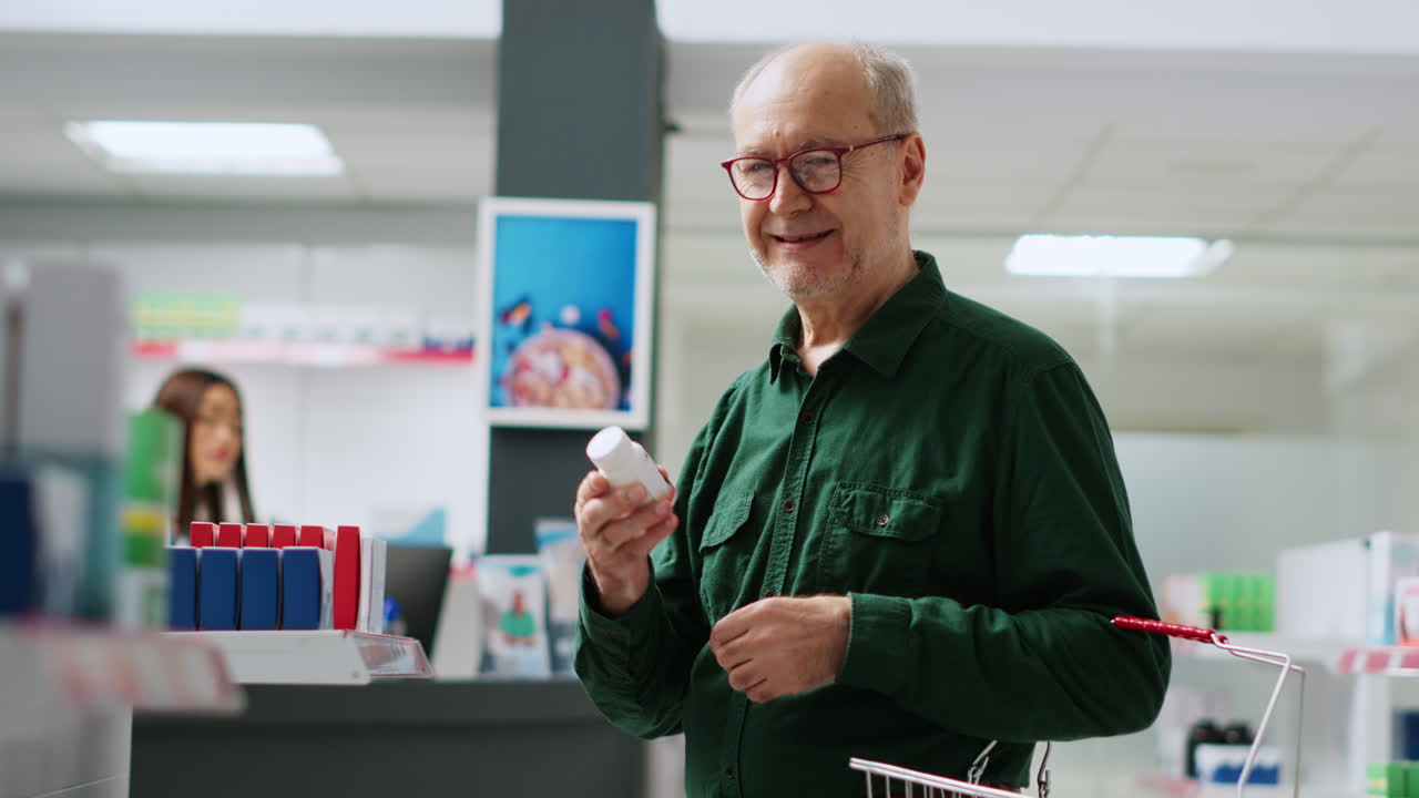 Elderly man selecting medication in a pharmacy