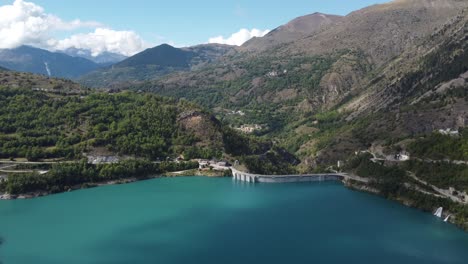 chambon lake aerial view calm clear water river in the middle of france alps mountains