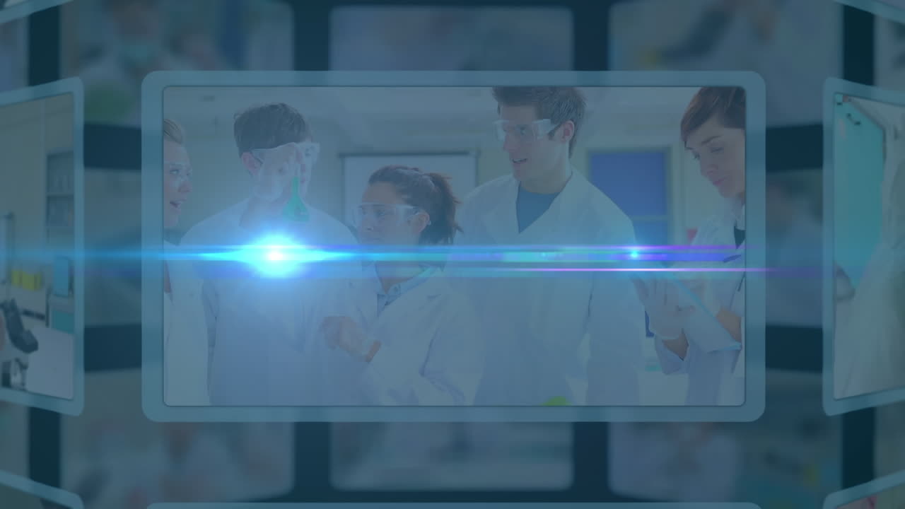 研究室で作業する科学者たちがいるスクリーン上を、明るい青い光のスポットが動くアニメーション