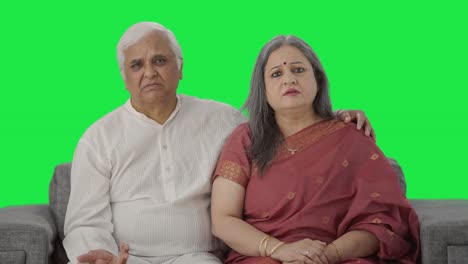 Old-Indian-couple-talking-to-the-camera-Green-screen