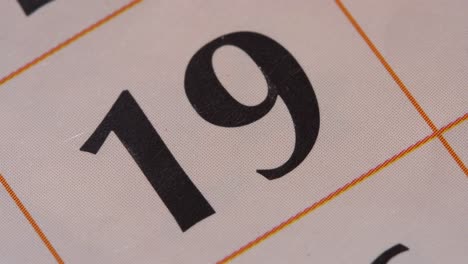 marking the date in the calendar with a red marker