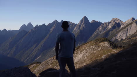 Man Overlooking Mountain Range