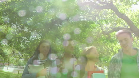 composite video of flowing water against group of diverse college students walking in the garden