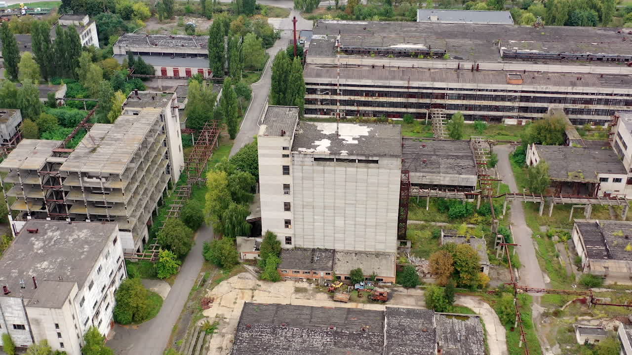 Exterior of industrial destroyed buildings. Destroyed aerial view of huge territory factory.
