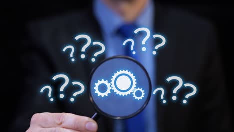 businessman with magnifier reveals gears and question marks. brainstorming and problem solving process