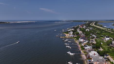 An-aerial-drone-shot-over-The-Great-South-Bay-by-Oak-Beach,-NY