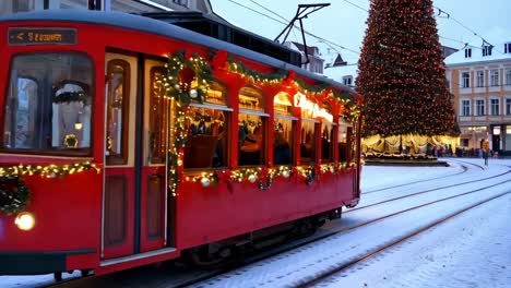 decorated christmas tram in snowy city