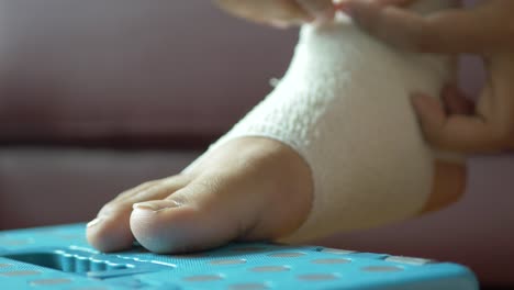 woman feet with bandaged on floor ,