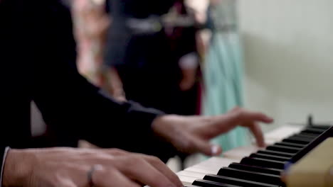 keyboard player playing at wedding ceremony