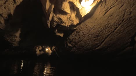 sailing through the cave in ha long bay vietnam