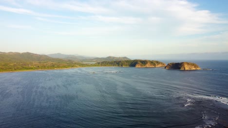 Aerial-view-over-the-coast-near-Samara-Beach-in-the-Guanacaste-Province,-Costa-Rica