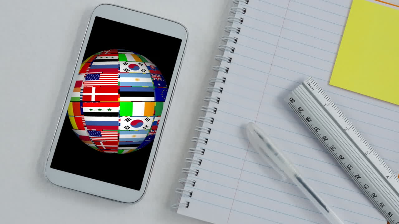 Animation of globe made of flags spinning in a phone screen