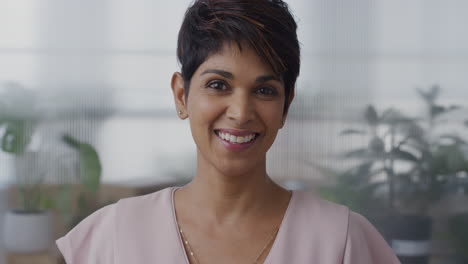 portrait-confident-young-hispanic-business-woman-smiling-enjoying-professional-career-lifestyle-successful-female-entrepreneur-looking-happy-in-office