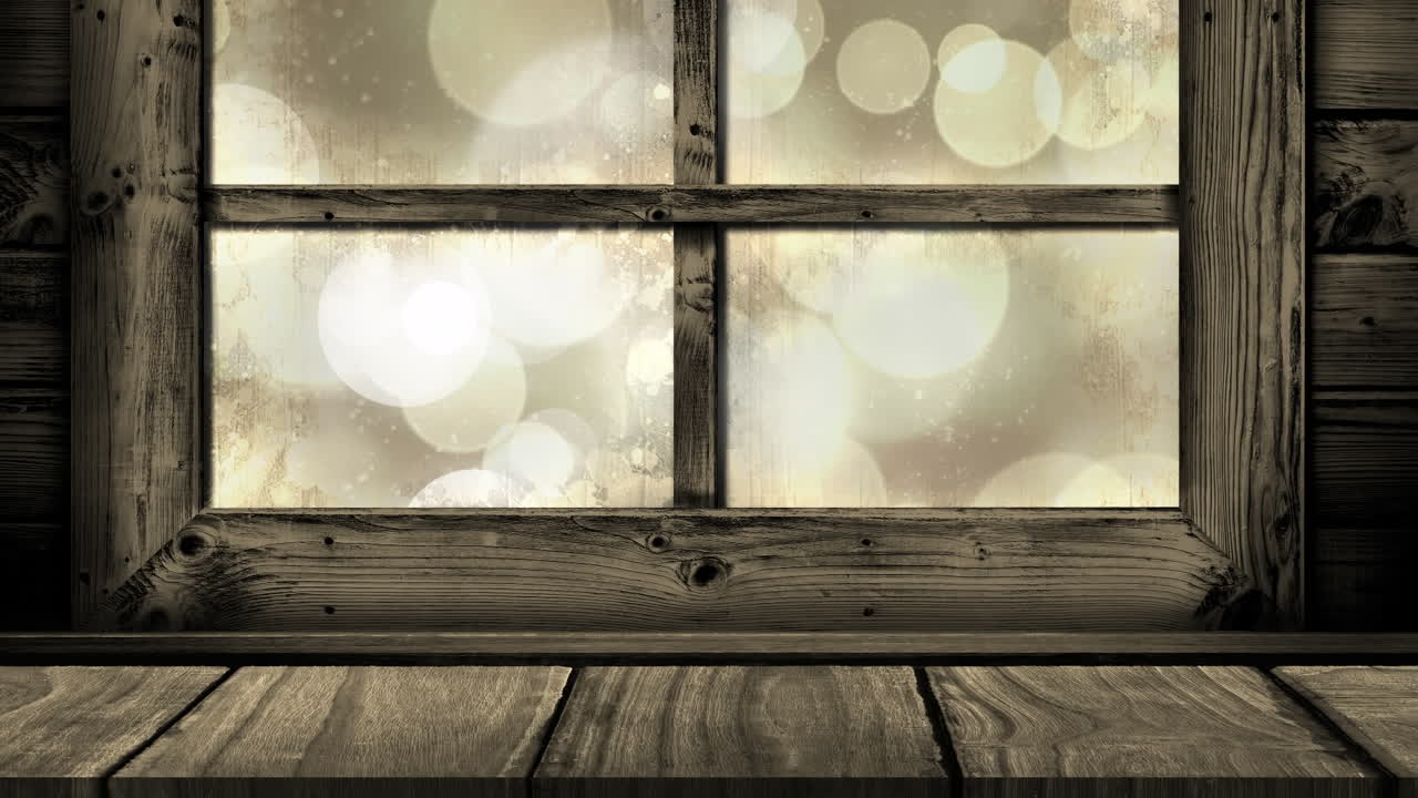 나무 창문 프레임의 애니메이션과 초점을 맞추지 않은 색 크리스마스 불빛.