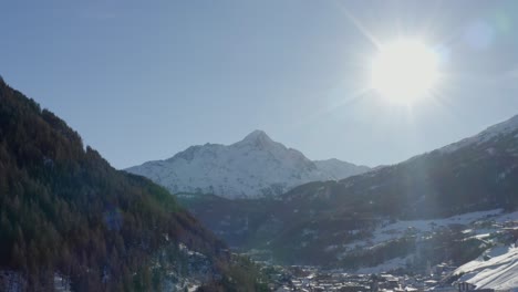a powerful winter sun shines over the ötztal alps, capturing the majestic mountain landscape near sölden.