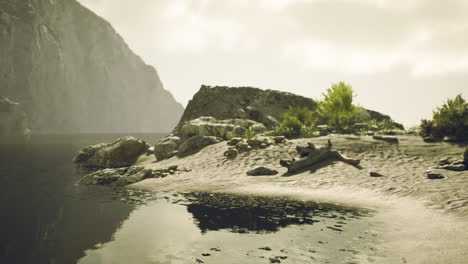 tranquil lake shores with rocky formations near cliffs in peaceful portugal
