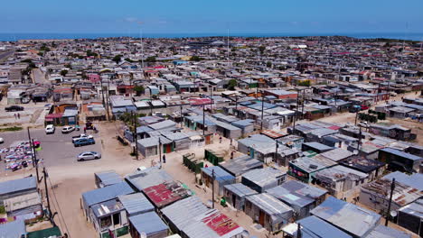 aerial view over corrugated iron shacks in south african township