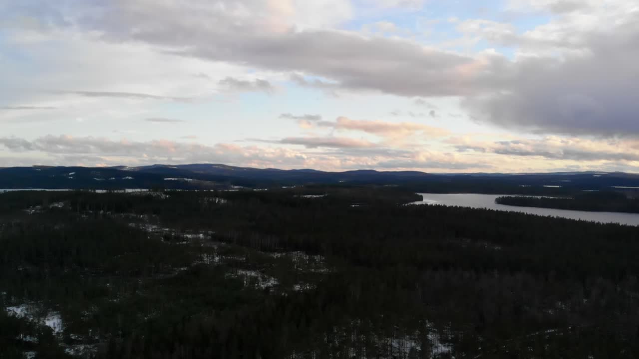 Drone shot of a snowy landscape in Sweden.