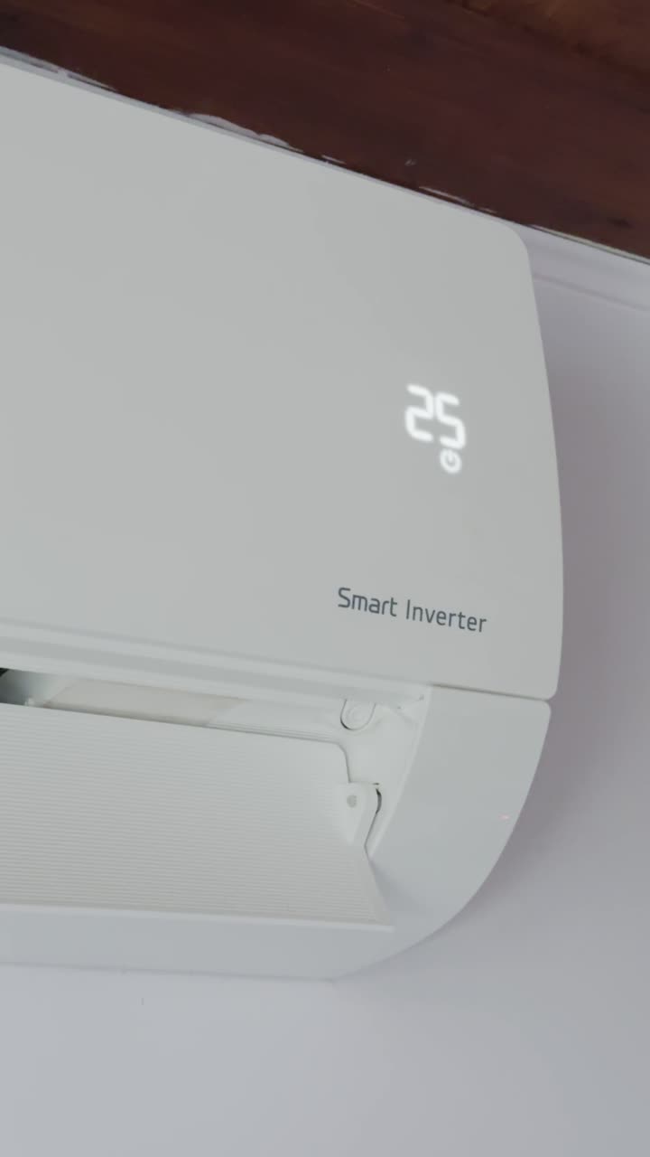 Low angle view of smart inverter unit reducing heat in residential interior. Ideal for cooling, energy saving, and comfort concepts