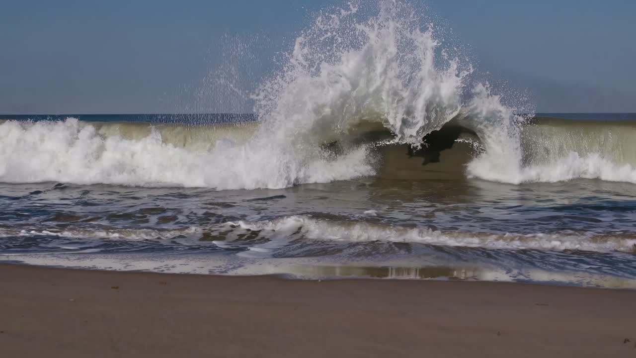 A serene ocean wave captured at eye level, creating a calming video scene