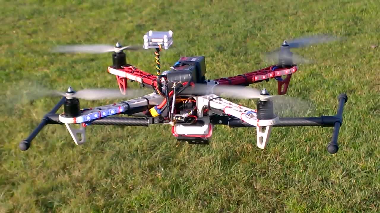 Drone flying over grass