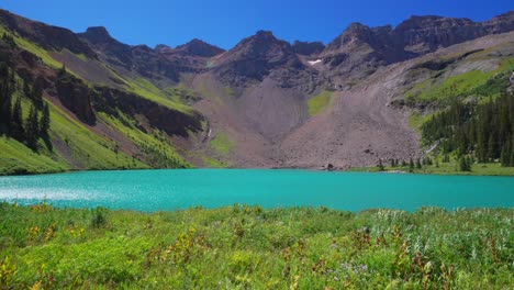 upper lower blue lake mount sneffels wilderness beautiful sunny morning ridgway telluride colorado san juan rocky mountains dallas range hiking trail wildflowers blue sky wilson peak static shot