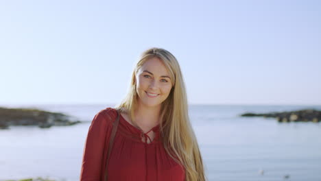 young woman, happy and freedom on beach for relax