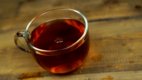 stir sweet tea cup of hot tea.