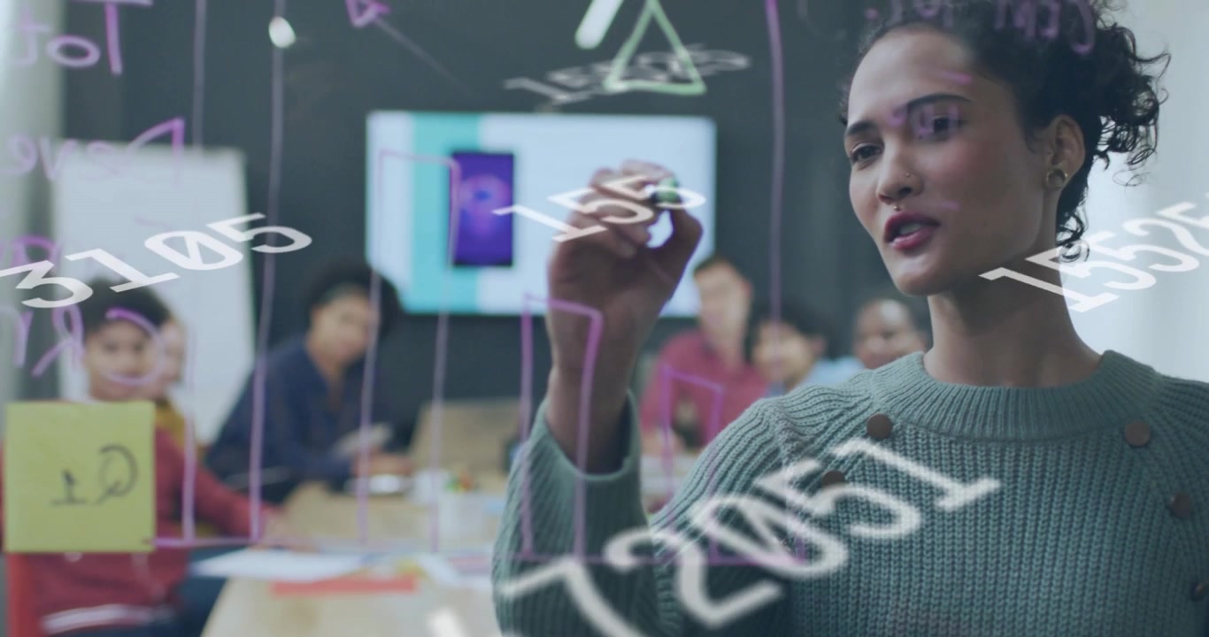 Woman presenting placing marker, writing on glass board while animated numbers showing project data