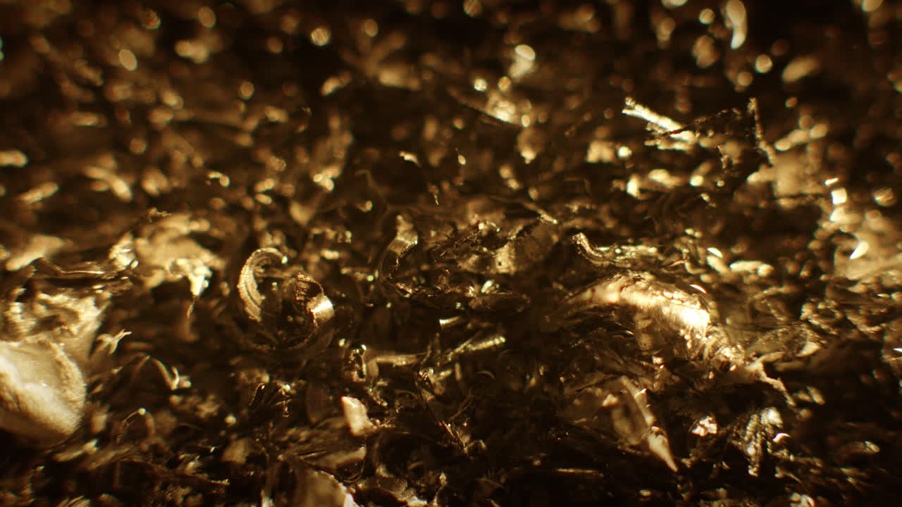 Golden color metallic raspings erratic movement