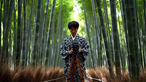 japanese photographer in a bamboo forest
