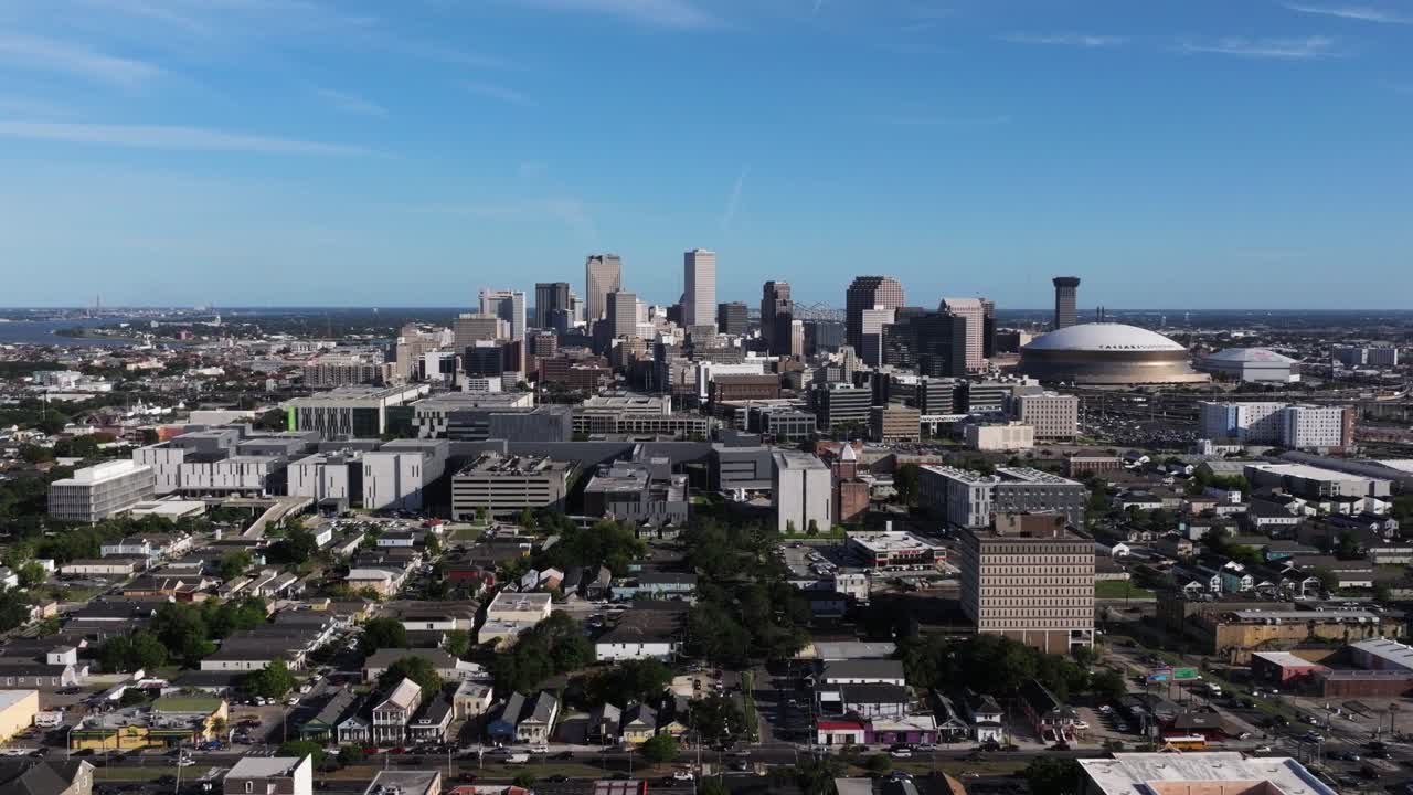 Drone Descends on New Orleans with Cityscape Skyline in Background
