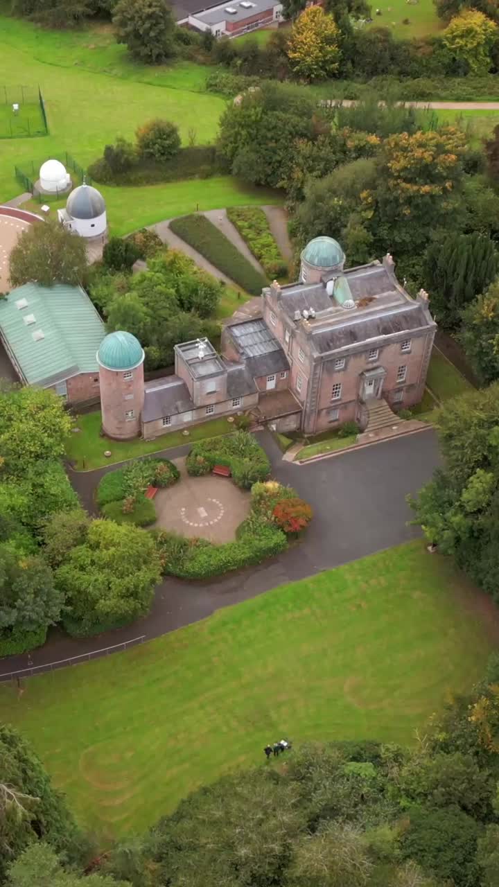Passing overhead social ratio 60FPS aerial of the grounds of Armagh Planetarium in County Armagh, Northern Ireland. Produced in 1080x1920 with broadcast ready Rec709 color