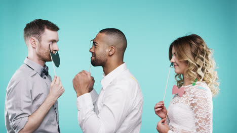Mixed-race-man-dancing-with-friends-slow-motion-party-photo-booth
