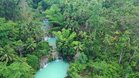 aerial view of majestic cambugahay falls , lazi, siquijor island, philippines