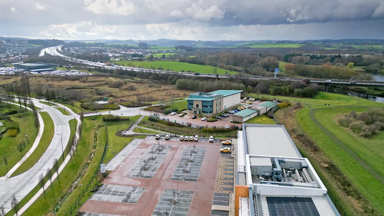 Aerial cinematic footage of commercial complex, trading estates in the city of Wakefield