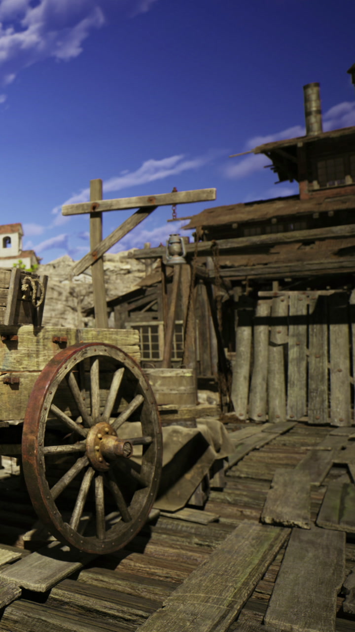 Rustic wooden cart rests against an old building under a vibrant blue sky