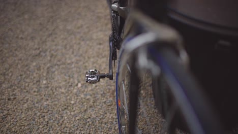 closeup shot of pedal of a mountain bike with blurred foreground