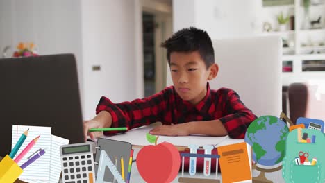 animation of school icons over asian schoolboy having laptop video call