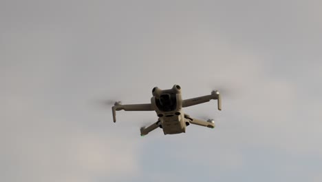 grey drone in flight